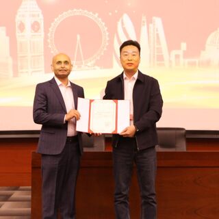 Junaid being awarded Guest Professor Title in Tianjin