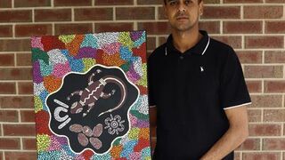 Artist with painting