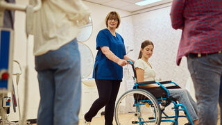 Helping disability in wheelchair